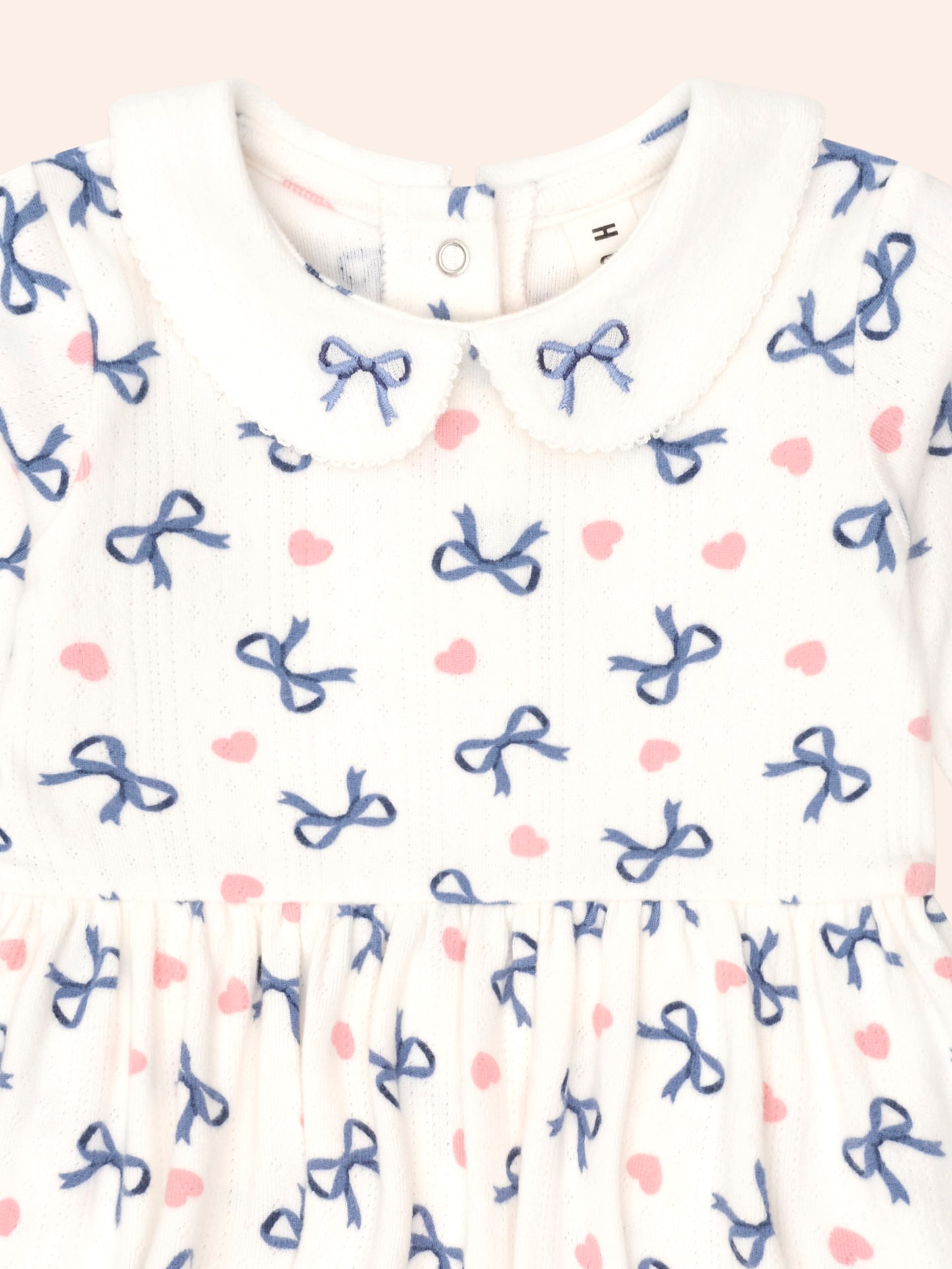 HEARTS AND BOWS ROMPER - ALMOND MILK