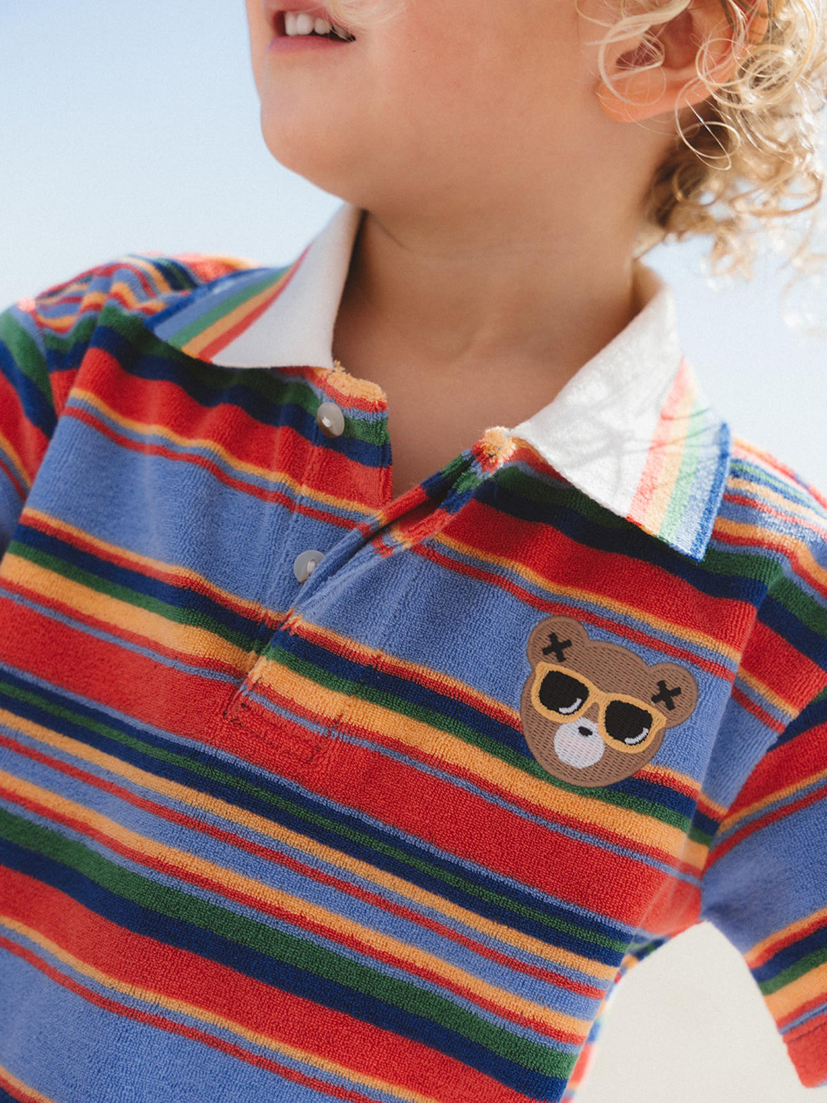 SUNSET STRIPE HUX TOWELLING POLO
