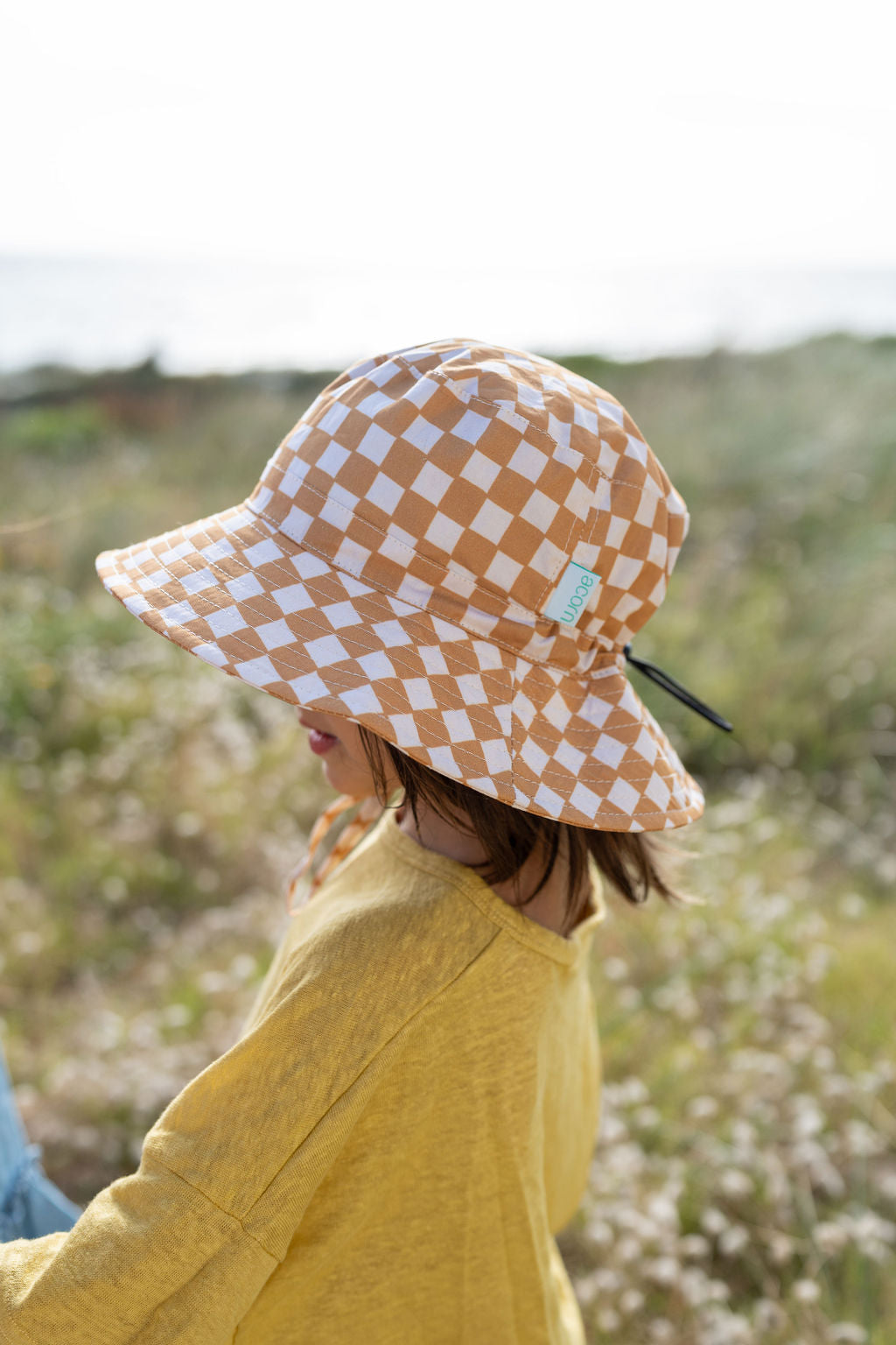 CHECKMATE WIDE BRIM BUCKET HAT - CARAMEL | CREAM