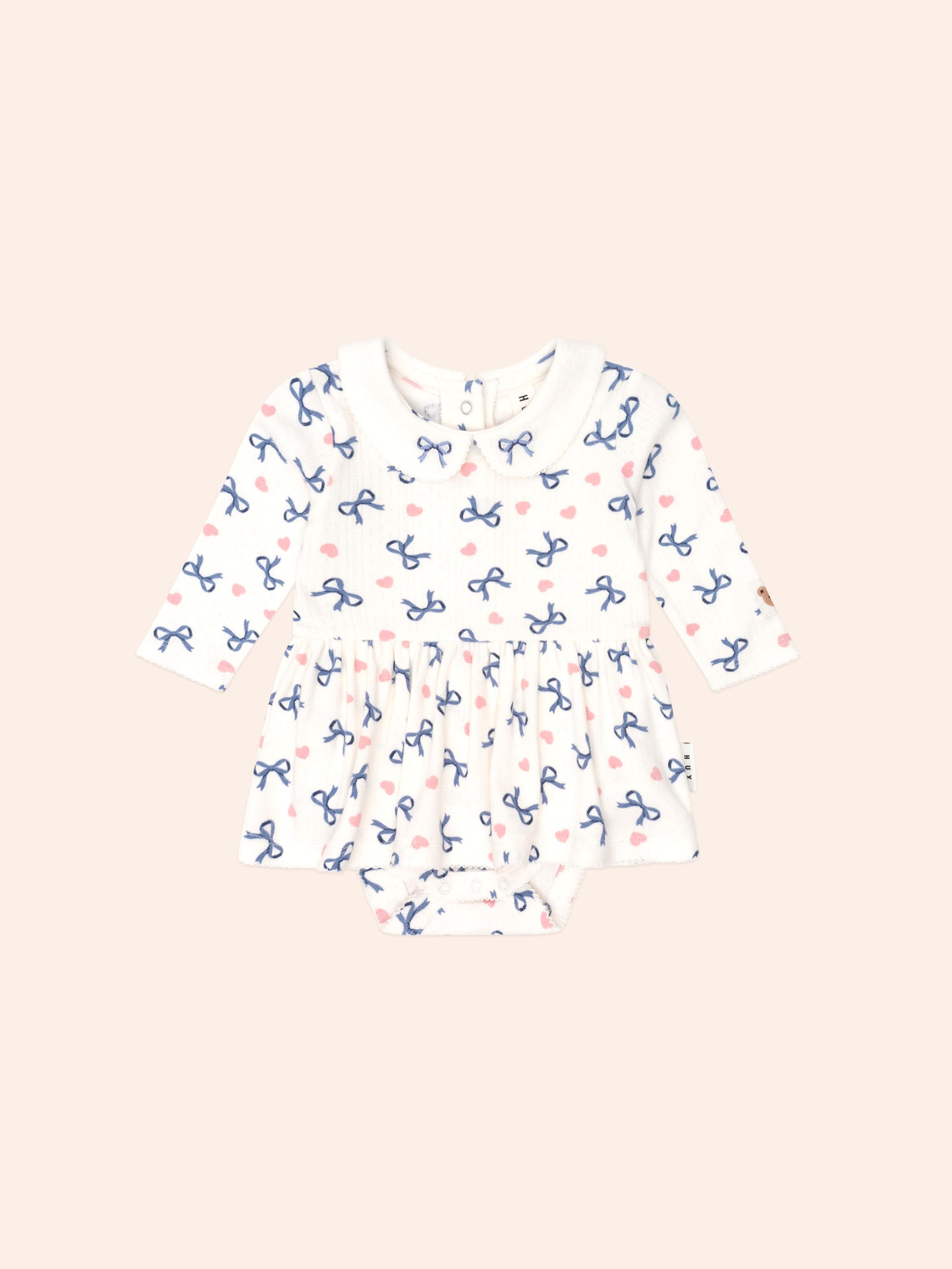 HEARTS AND BOWS ROMPER - ALMOND MILK
