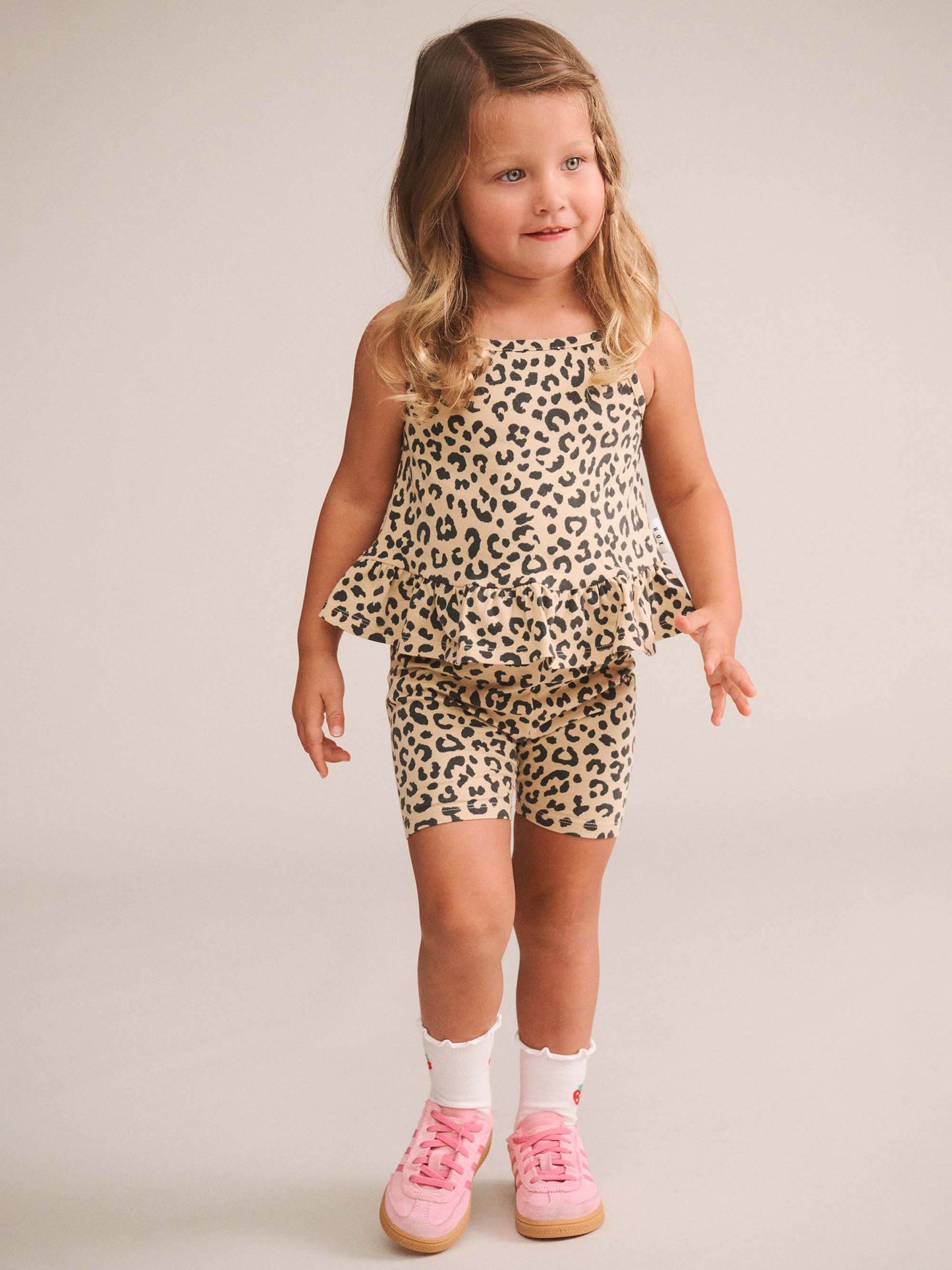LEOPARD PEPLUM TANK TOP - ANIMAL